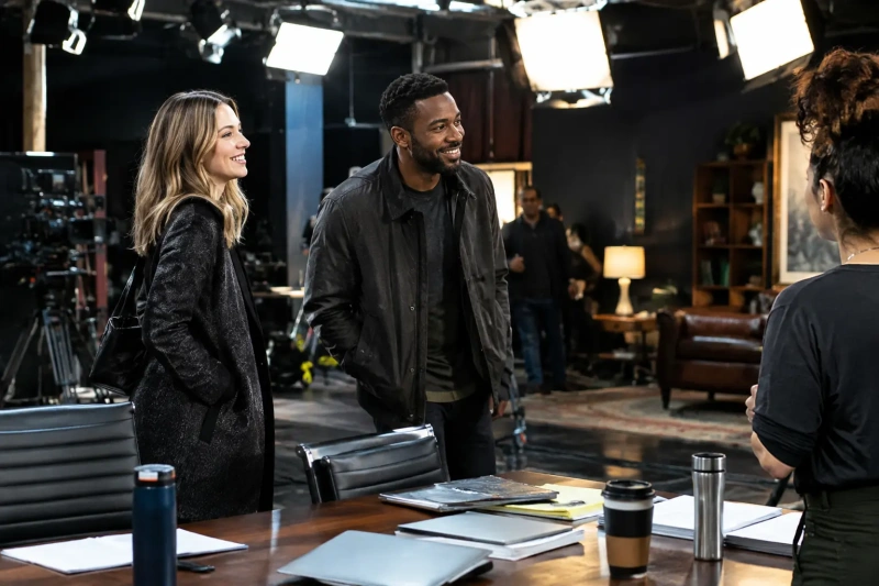 television-drama-writers-room-and-production-set-with-two-guest-actors-arriving-.png
