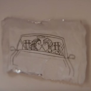 You eventually see he had been drawing all their most important moments on the wrappers…